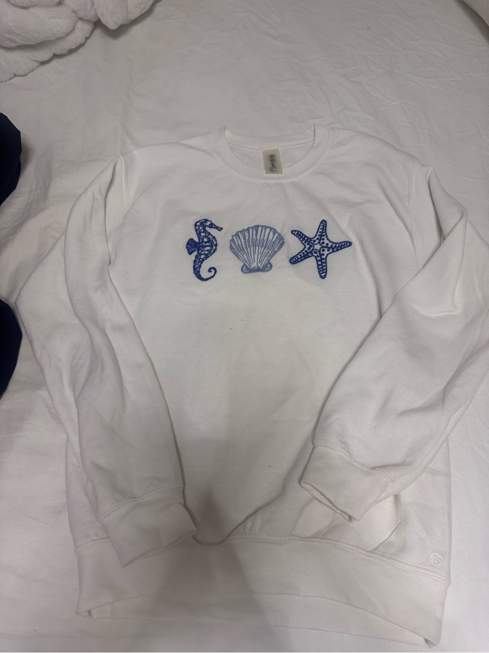 White Crewneck Sweatshirt with Blue Sea Motif